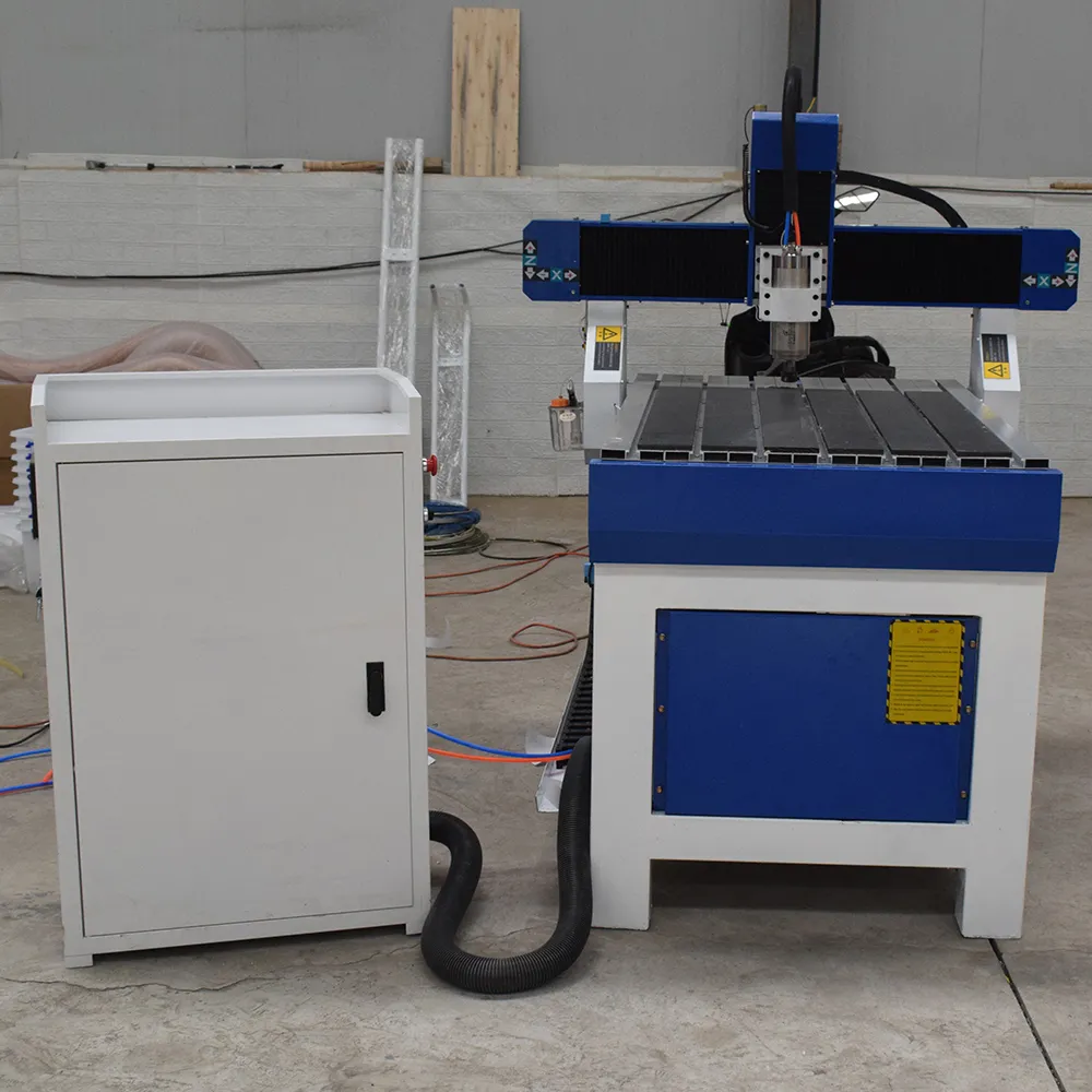 YH6090 CNC Router with Aluminum T-Slot Table for Advertising 3 Multi-angle views of the YH6090 CNC advertising router (featuring an aluminum T-slot table)