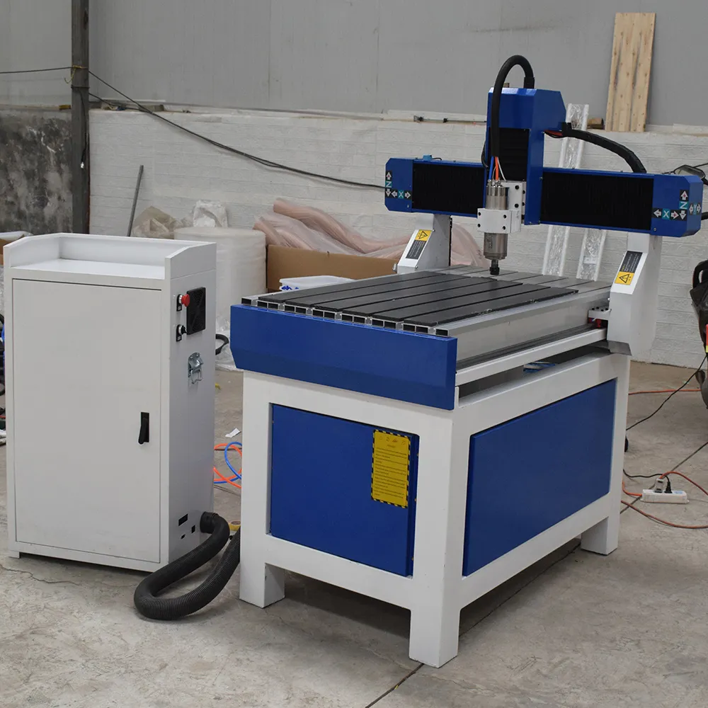 YH6090 CNC Router with Aluminum T-Slot Table for Advertising 5 Multi-angle views of the YH6090 CNC advertising router (featuring an aluminum T-slot table)