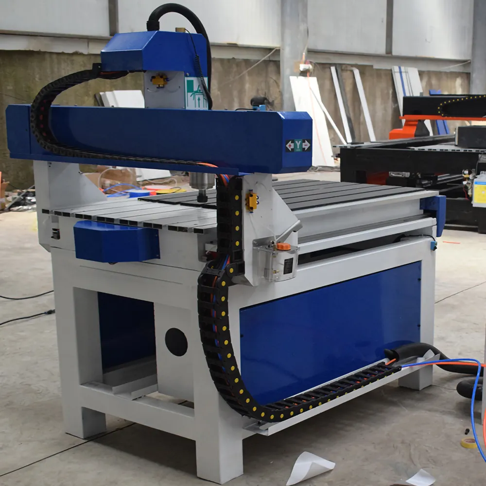 YH6090 CNC Router with Aluminum T-Slot Table for Advertising 13 Multi-angle views of the YH6090 CNC advertising router (featuring an aluminum T-slot table)