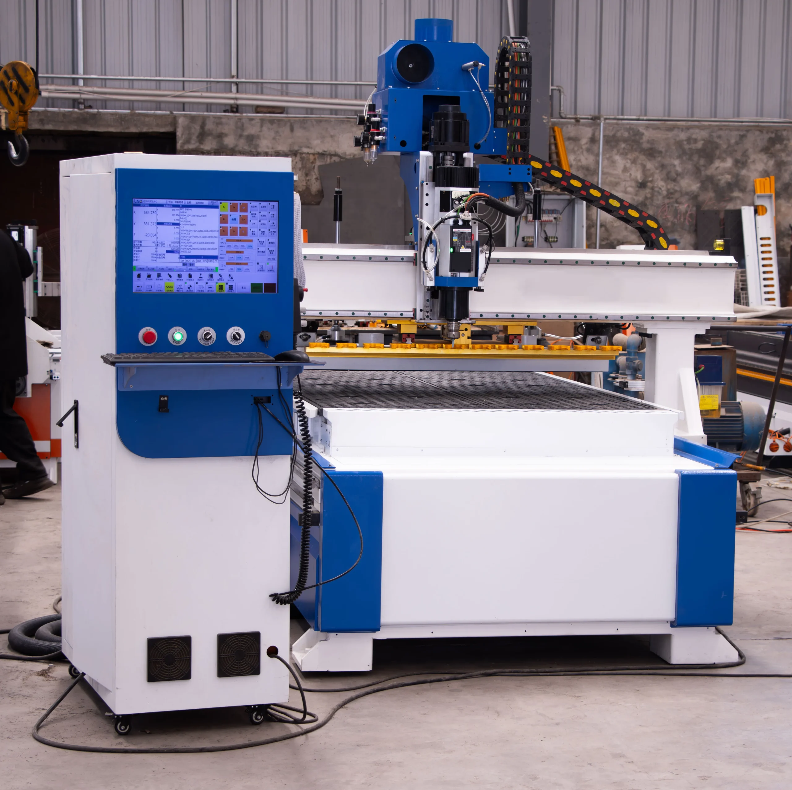 1225 Single Head ATC CNC Router with 12-Tool Linear Magazine 7 Front view of the 1225 YK1PRO CNC engraving machine featuring a 12-position linear ATC tool magazine.