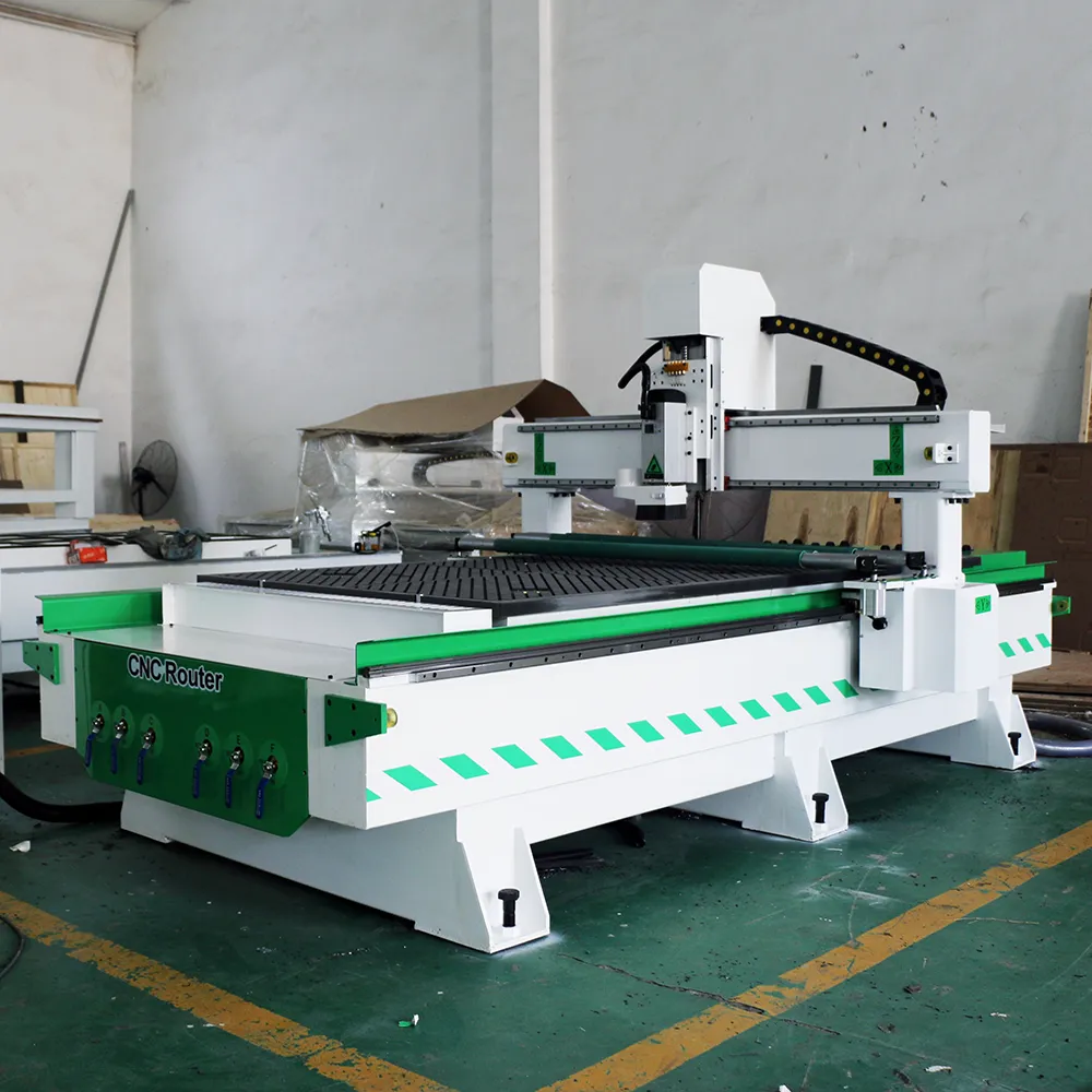 Low Cost 4x8 CNC Router with Press Rollers & Vacuum Table for Thin Board 3 Close-up of the front of the 1325 single-head nesting machine with vacuum table and pressure rollers