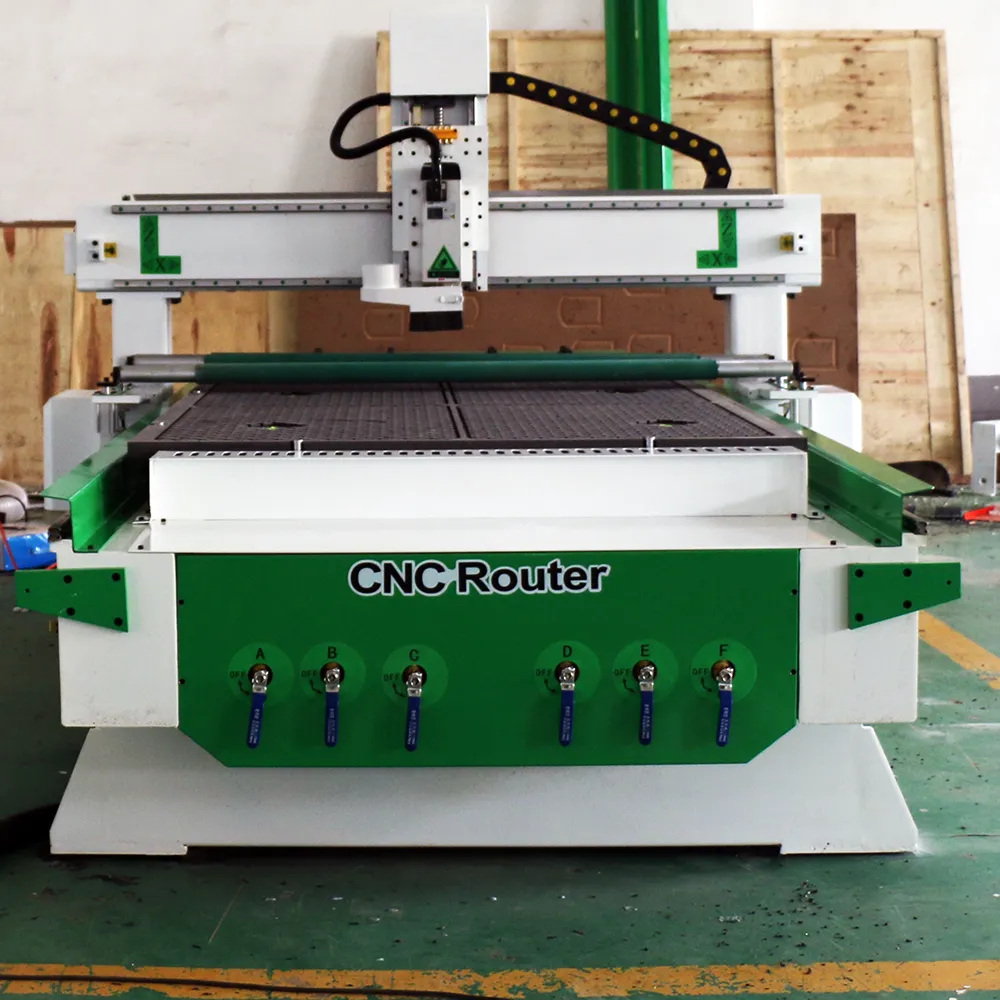 Low Cost 4x8 CNC Router with Press Rollers & Vacuum Table for Thin Board 5 Close-up of the front of the 1325 single-head nesting machine with vacuum table and pressure rollers