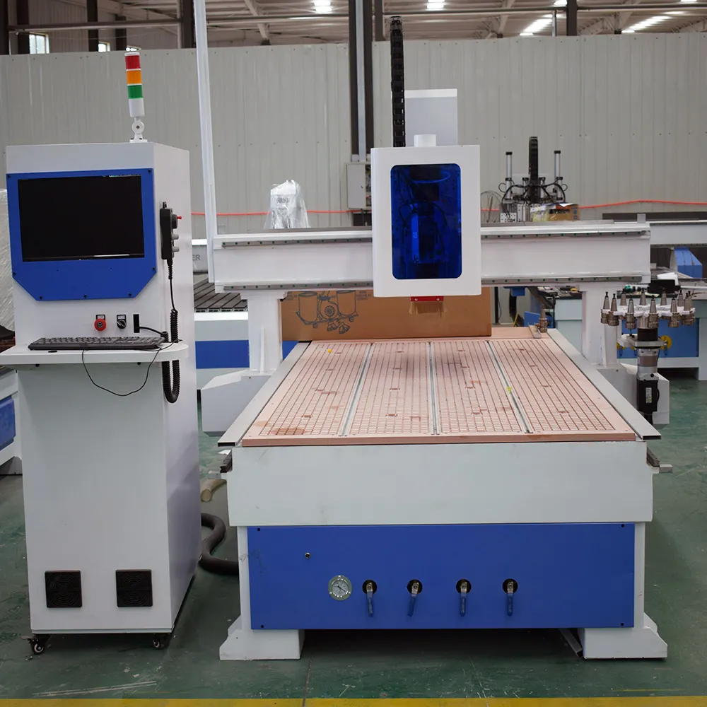 Profitable 4x8 Carousel ATC CNC Router with Dust Cover 5 Direct front view of 1325 wood CNC machine showing standalone operator cabinet, enclosed spindle head, and 4-zone vacuum valves