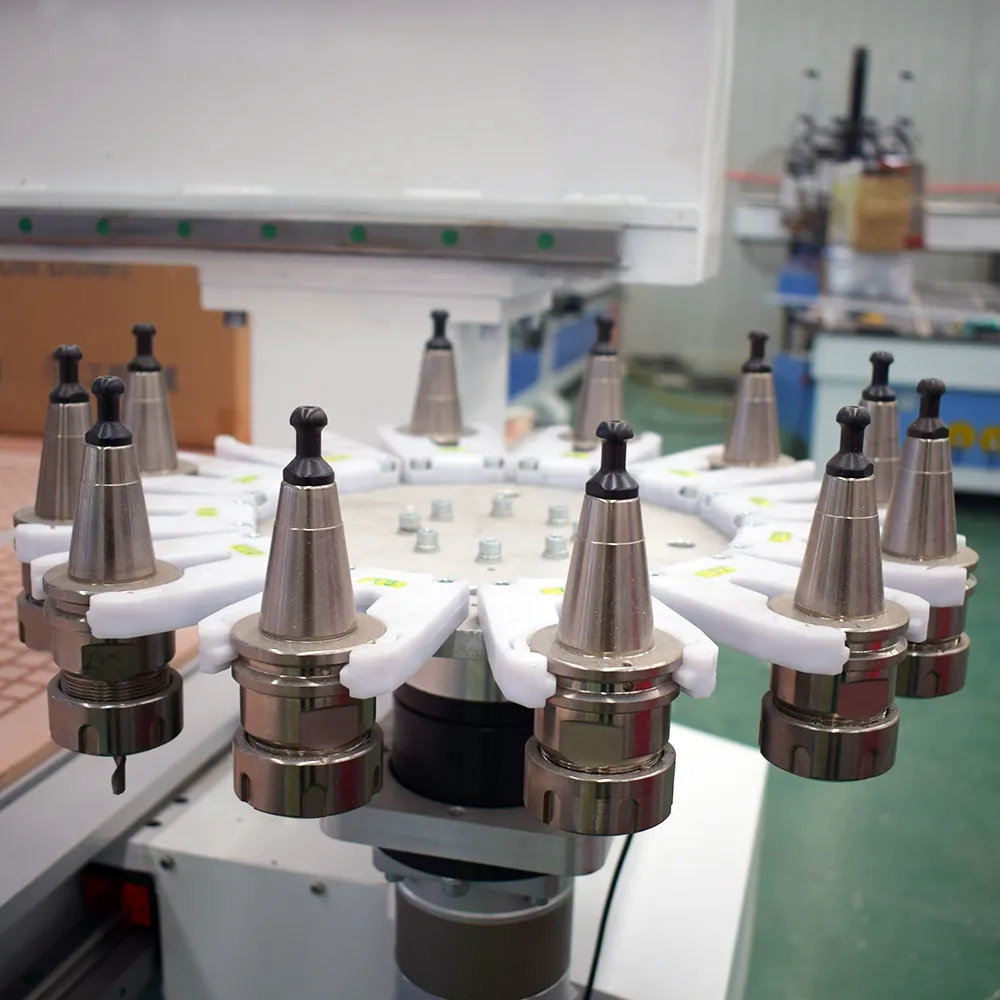 Profitable 4x8 Carousel ATC CNC Router with Dust Cover 9 Close-up of 12-slot rotary ATC carousel magazine equipped with ISO30 tool holders and high-tenacity nylon forks