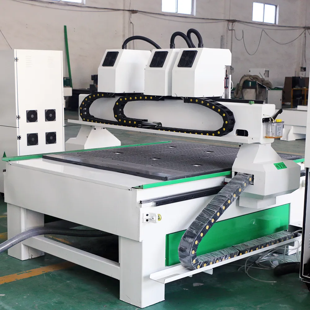 4x4 Three Head CNC Router with Independent Z-Axis for Mass Production 7 Rear gantry detail of 3-head CNC router showing individual Z-axis motor hoods, drag chains, and lubrication pump