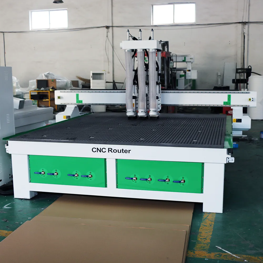 Industrial 8x8 Three-Head CNC Wood Carving Machine With Independent Z-Axis 3 Front view of YIHAICNC 2325 extra wide 8x8 ft three head CNC wood router with 8 independent vacuum ball valves