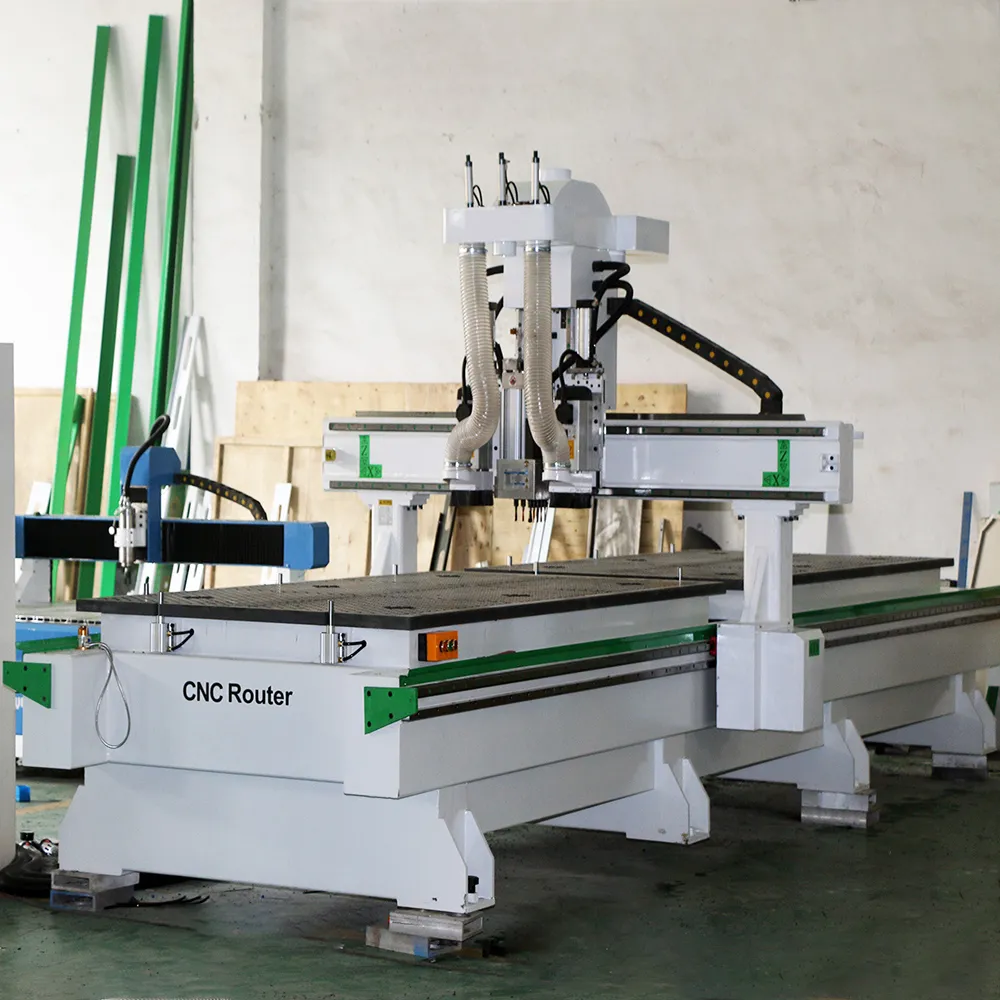 4x 16 Three Process CNC Nesting Machine With Drill Bank For Cabinet Production 3 Three-quarter view of YIHAICNC 4x16 three process CNC nesting machine with drill bank and 1300x5000mm vacuum bed