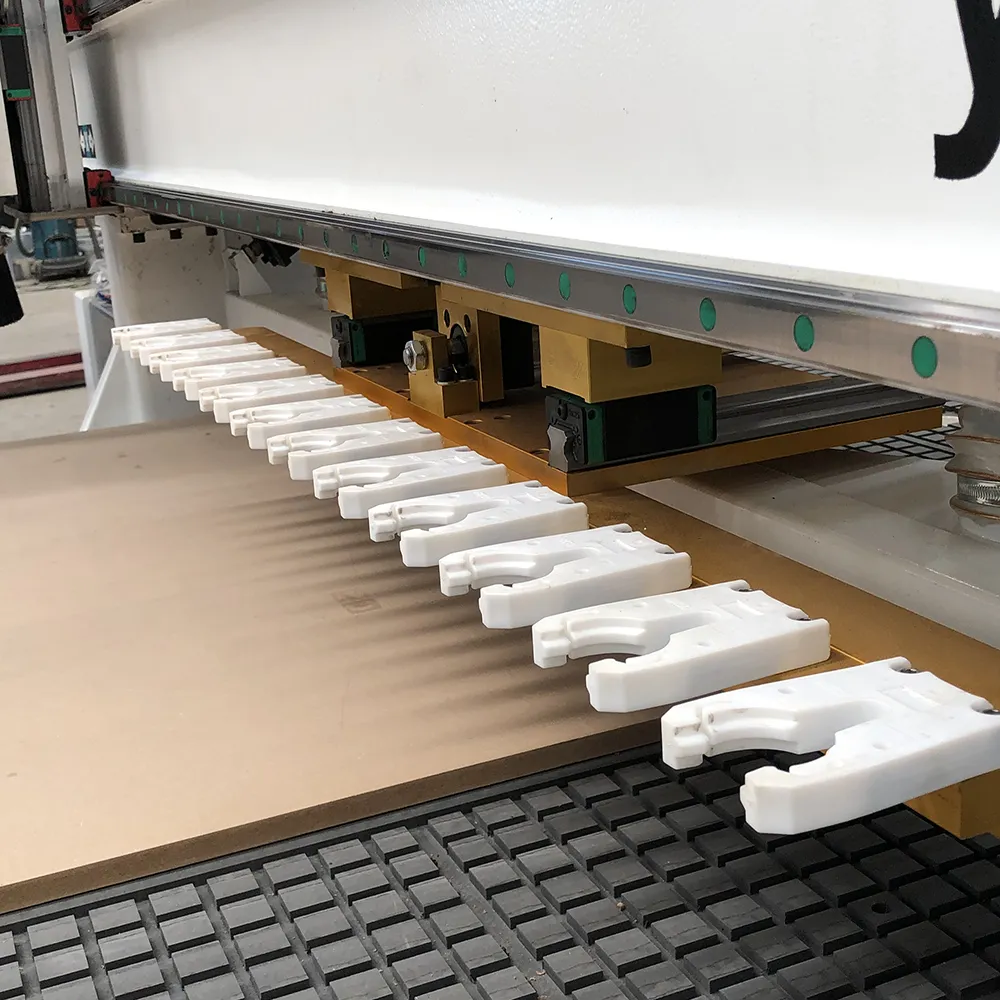 5x10 Linear ATC CNC Router With 12 Tools For Large Panel Processing 7 Detail closeup of 12-position linear tool magazine with high-tenacity polymer tool forks on CNC gantry